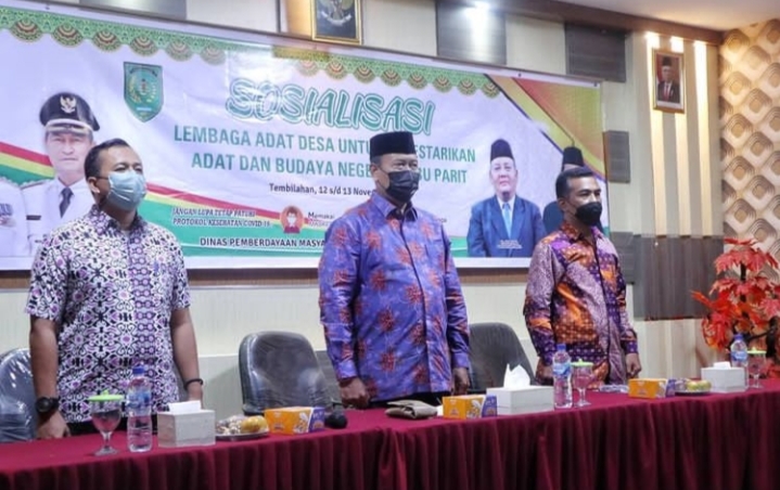 Bupati Inhil Diwakili Asisten I Tantawi Jauhari Buka Sosialisasi Lembaga Adat Desa Tajaan Dinas PMD